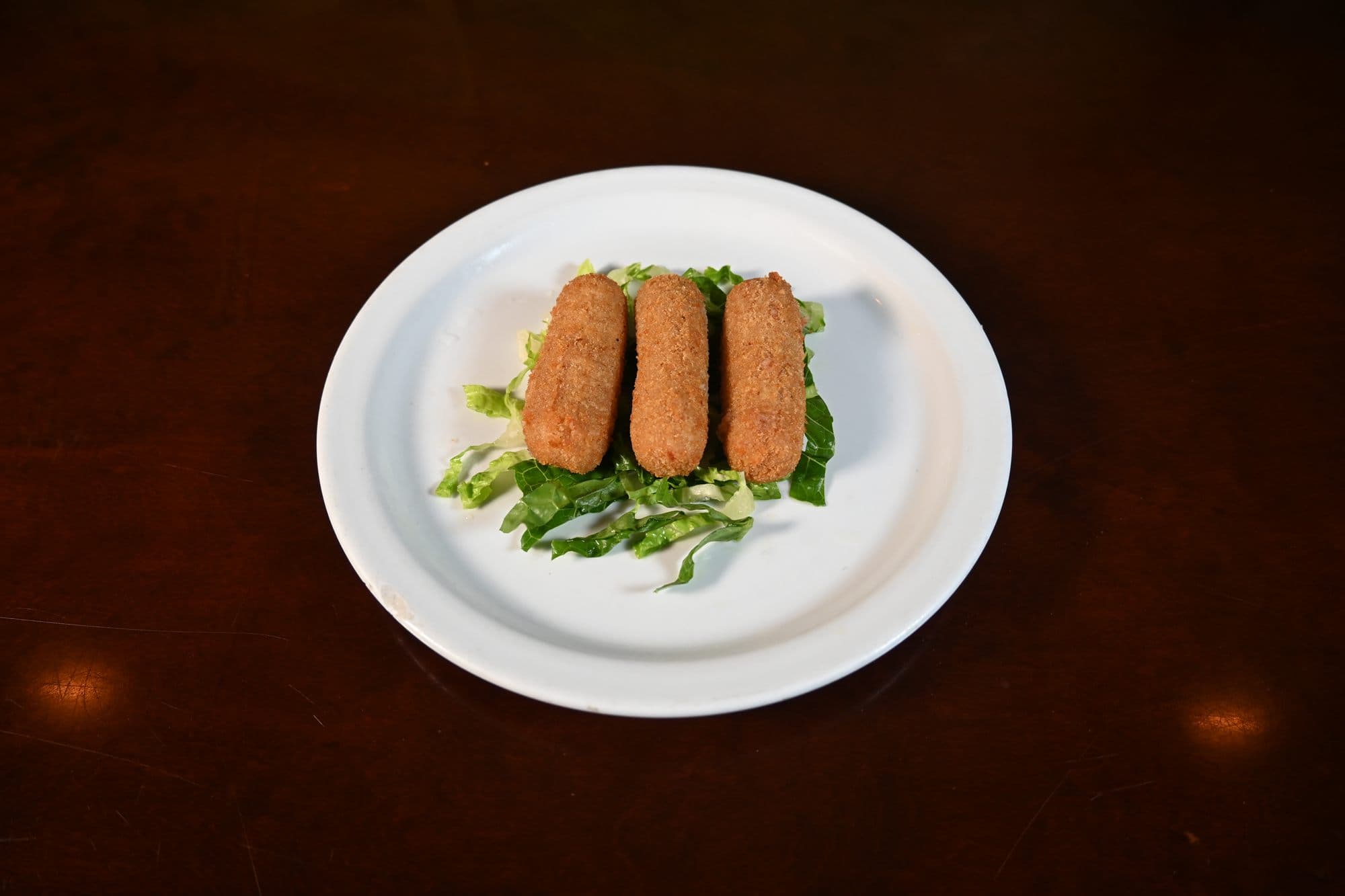 Ham croquetas, crisp outside and creamy in the middle