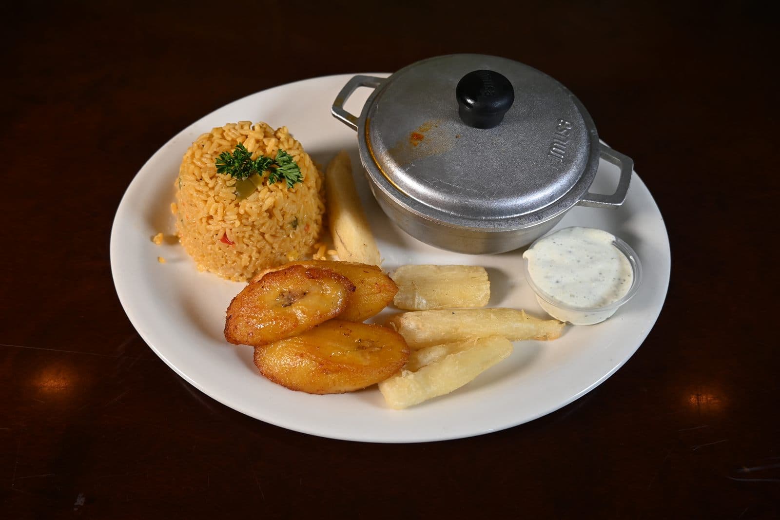 Cuban combination platter with yuca and tostones