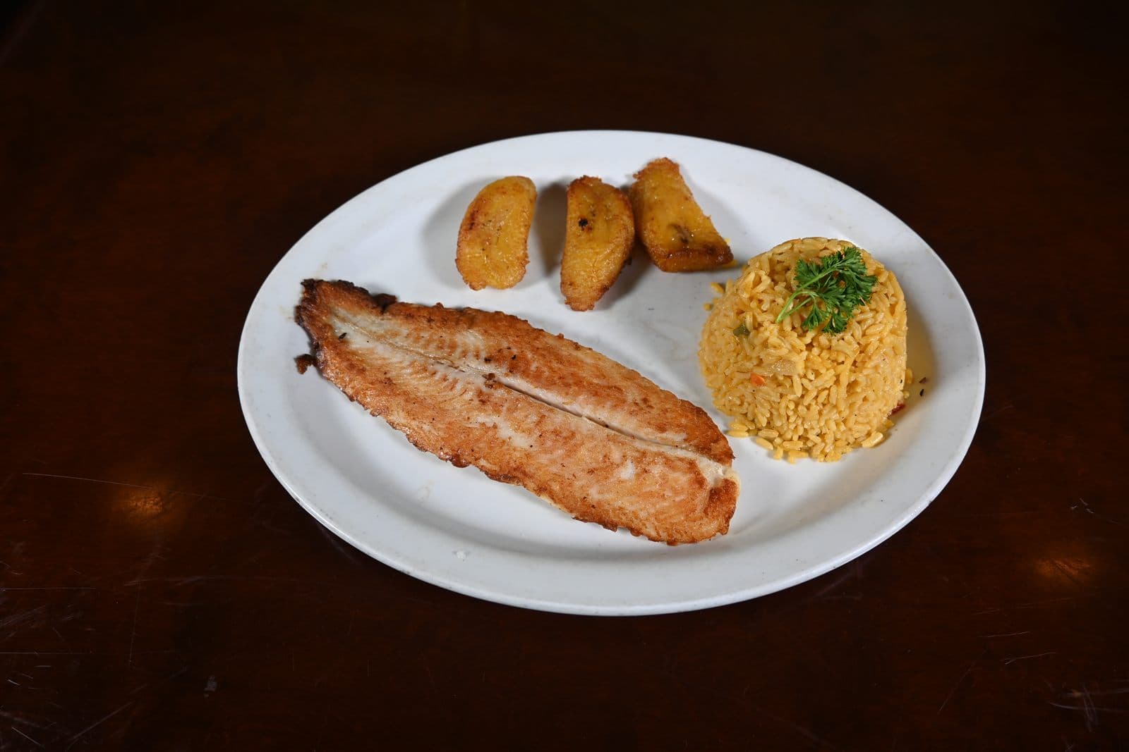 Grilled fish filet with yellow rice